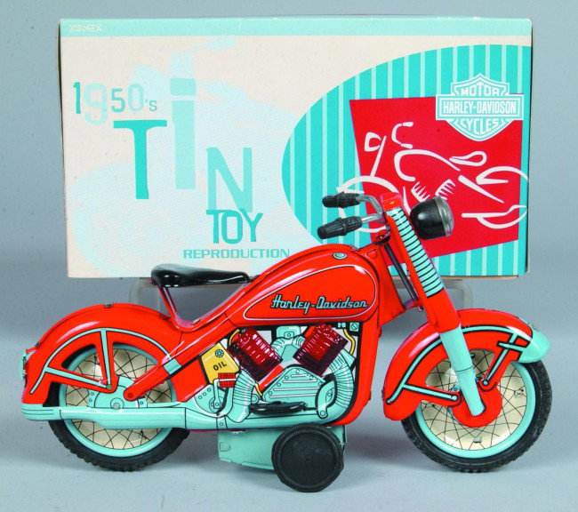 H-D Motorcycle, in original box, lithograph tin 19: H-D Motorcycle, in original box, lithograph tin 1950's reproduction, friction motor drive, also light up engines, Mfg. Xonex, Cleveland, OH, made in China, 9"l., very good.