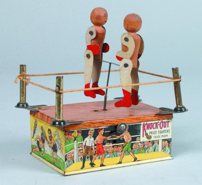 Knock-Out Prize Fighters, wind-up lithograph tin, : Knock-Out Prize Fighters, wind-up lithograph tin, wood figures, Mfg. Ferdinand Strauss Corp., patented Oct. 1921, 5-3/4"l. x 6-1/4"h., good.