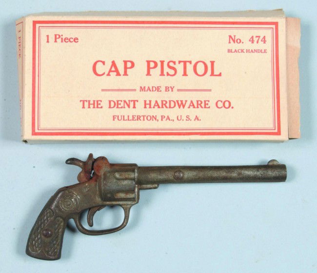 Cap Pistol, with original box, cast iron, Mfg. Den: Cap Pistol, with original box, cast iron, Mfg. Dent Hardware, Co., 3" x 5-1/4" condition: both fair