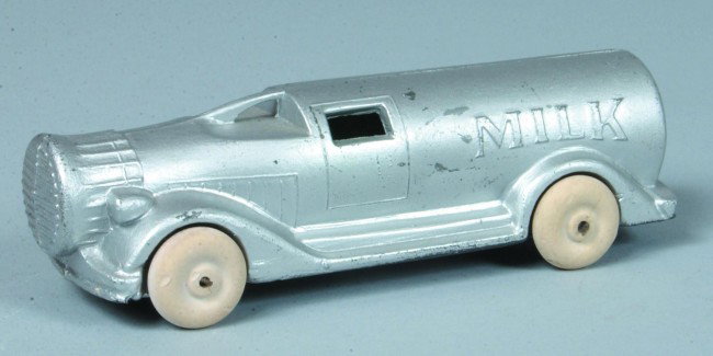 Milk Bottle Truck, slush cast pot metal, Mfg. Barc: Milk Bottle Truck, slush cast pot metal, Mfg. Barclay. 5-3/16"l., good, light scratches.