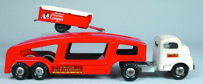 Auto Transport Truck, #706, painted pressed steel,: Auto Transport Truck, #706, painted pressed steel, Mfg. Structo Toys, two pieces, 22"l., good., Tee-pee Camper, painted pressed steel and plastic, Mfg., Buddy L, 9-1/2"l., fair.