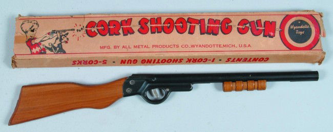 Cork Shooting Gun, with original box, marked All M: Cork Shooting Gun, with original box, marked All Metal Prod. Co., Wyandotte, MI, 20-1/4" long, condition: gun, very good; box, fair