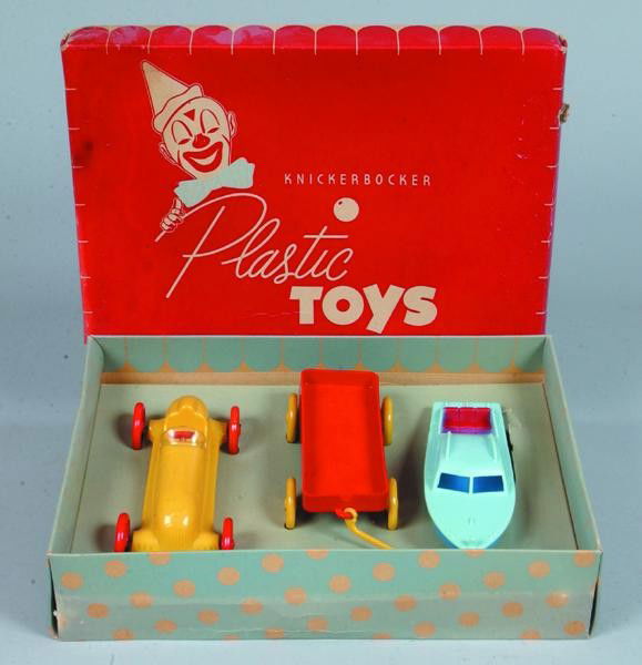 Box of Three Knickerbockers Toys, set #263, plasti: Box of Three Knickerbockers Toys, set #263, plastic racer 5-1/2" l., coaster wagon 4-1/2" l and boat 6" l., very good, like-new in box.
