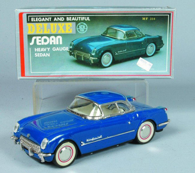 1954 Corvette Model Car, mfg. made in China, paint: 1954 Corvette Model Car, mfg. made in China, painted stamped tin with plastic trim in original box, 9-3/4" l., front wheel friction motor, like-new in box.