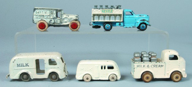 Lot of Five Various Milk Trucks including Barclay,: Lot of Five Various Milk Trucks including Barclay, Dinky Toys and others, 3" to 4 1/4" long. Condition: fair to good.