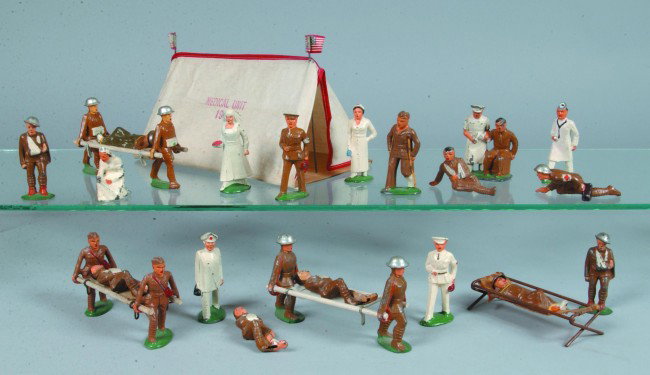 24 Various Barclay and Manoil Cast Lead Figures; U: 24 Various Barclay and Manoil Cast Lead Figures; U.S. Army medical staff and wounded soldiers with tent. Condition: good with normal wear.