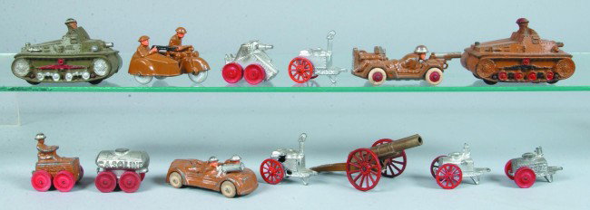 Lot of Various U.S. Army Vehicles including Barcla: Lot of Various U.S. Army Vehicles including Barclay Army motorcycle with side-car, Two-man machine gun car, Manoil motorized machine gunner, tank, two Auburn Rubber tanks and more. Condition: good wit