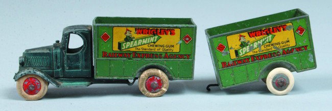 Tootsietoy 810 Mack Wrigley's "Railway Express Age: Tootsietoy 810 Mack Wrigley's "Railway Express Agency" Truck and Trailer, truck 4" long, trailer 2 1/4" long. Condition: good with normal scratches and wear.