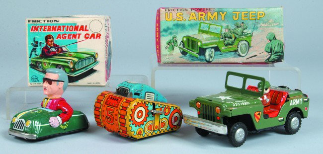Lot of Three Tin Lithograph Toys; Marx "Internatio: Lot of Three Tin Lithograph Toys; Marx "International Agent Car" friction toy with box, 4" long, Marx Sparkling Tank wind-up, 4" long and Yone "U.S. Army Jeep" friction toy with box, 6-3/4" long. Cond