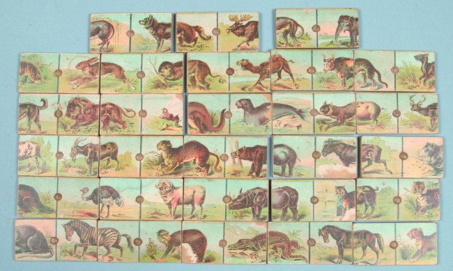 U Match 'M Lithographed Paper Wood Blocks, no make: U Match 'M Lithographed Paper Wood Blocks, no makers marks, 2" w. x 4" l., 28 pcs each block with two 1/2 mages of birds and animals, moderate use wear good.