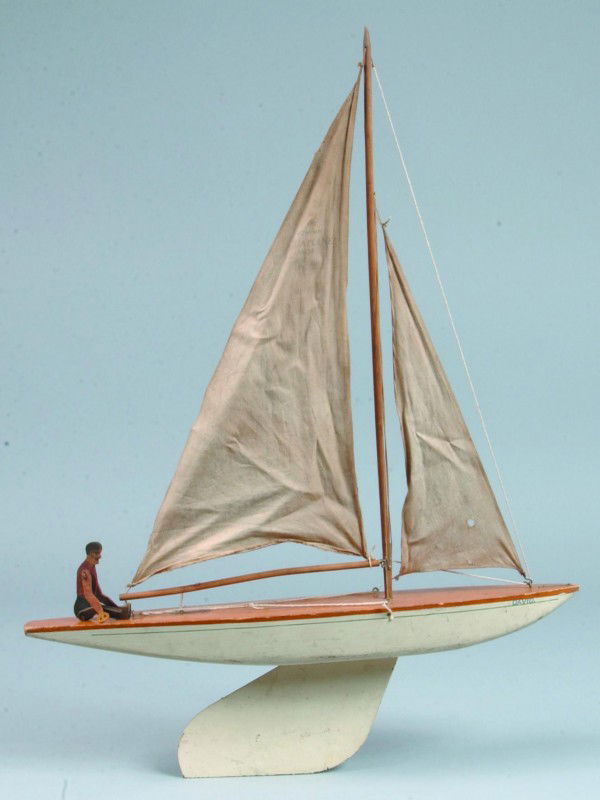Pond Sail Boat, decal on deck "Bowman Racing Yacht: Pond Sail Boat, decal on deck "Bowman Racing Yacht", made in England, painted wood hull, replaced rigging, 21-1/2" long, moderate use wear, fair condition.