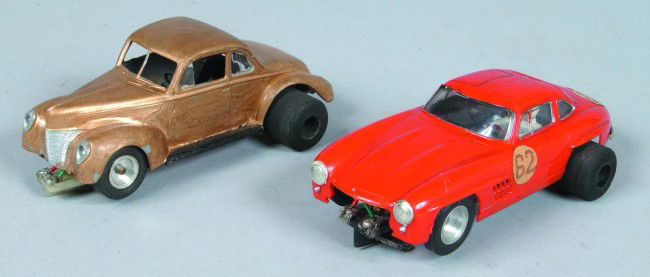 Two Slot Cars, 1/32 scale, custom made after marke: Two Slot Cars, 1/32 scale, custom made after market plastic bodies on metal chassis, 12V motors, Mercedes Coupe 5-1/4" l. and 1940 Ford Coupe, 4-3/4" l.