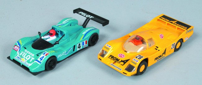 Two Slot Cars, 1/32 scale, Horby Hobbies & SCX Spa: Two Slot Cars, 1/32 scale, Horby Hobbies & SCX Spain, Porsche and Ferrari, 5-3/4" l., plastic bodies on plastic chassis, 12V motor.