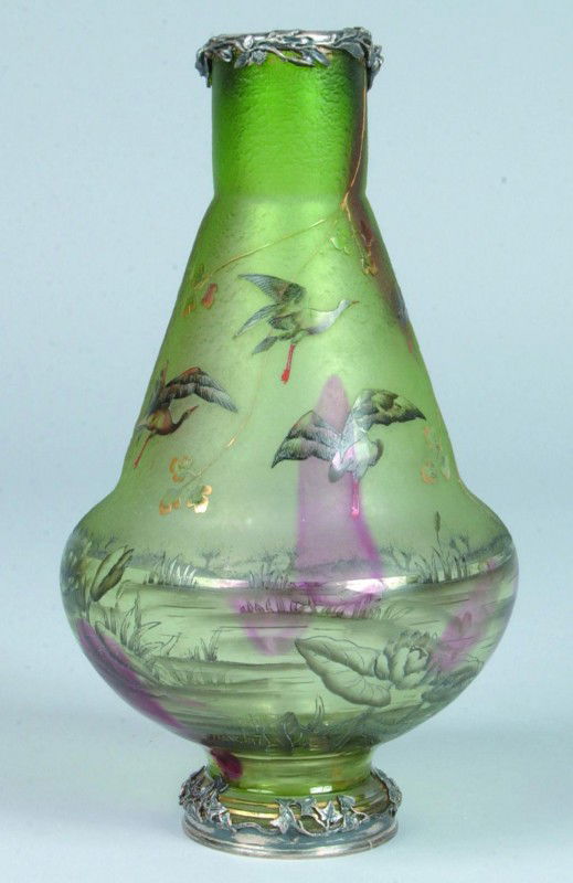 Daum Nancy Silver Mounted Cameo Art Glass Vase, gr: Daum Nancy Silver Mounted Cameo Art Glass Vase, green glass with cranberry drips, roughly etched to smooth two-tone, cut and painted water scene with cranes in flight. Signed "Daum Nancy" with cross o