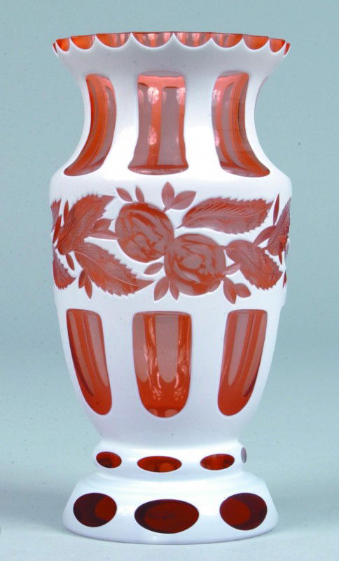 Overlay Art Glass Vase with opaque white cut to pe: Overlay Art Glass Vase with opaque white cut to peach colored vase. Paneled design with fruit and foliate central band. Signed on bottom "Tcho' coslovagule". 6 3/4" high. Condition: good.