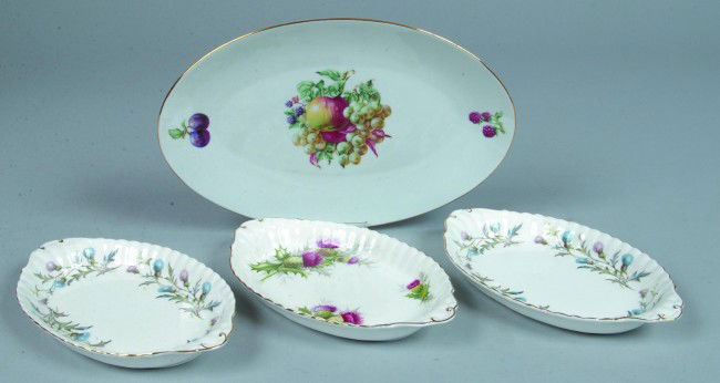 Four Oval Service Dishes, 3 white bone china with: Four Oval Service Dishes, 3 white bone china with thistle decoration, marked: ROYAL ALBERT, England, 8.5"l.; white porcelain with fruit decorations, marked: Naaman, Israel, 11.5"l. Condition good