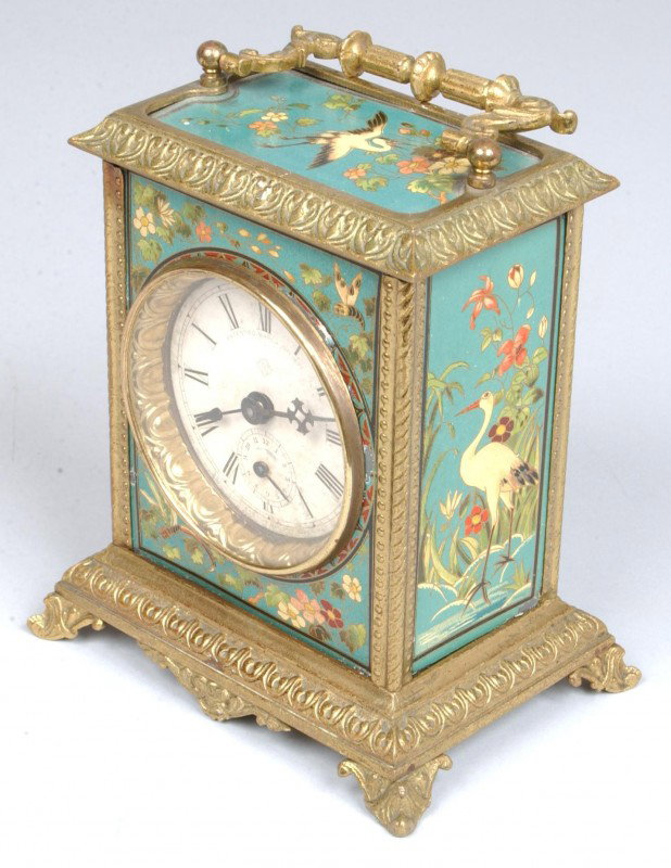 Ansonia French style Musical Alarm Carriage Clock;: Ansonia French style Musical Alarm Carriage Clock; 6.5"h. x 5.25"w. x 3.5"d.; cloisonné lithographed iron panels set in brass frame with handle; paper dial with seconds dial within; winder, time set,