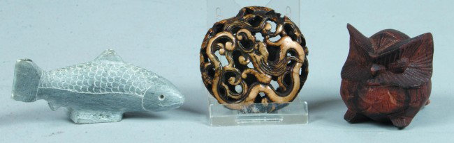 Three Carving Group, teak owl, 2"d., soapstone fis: Three Carving Group, teak owl, 2"d., soapstone fish, 2.75"l., Chinese bone netsuke with reticulated foliate and dragon decorations, 1.75"d. Condition: Fish appears to be missing tail tips, otherwise g