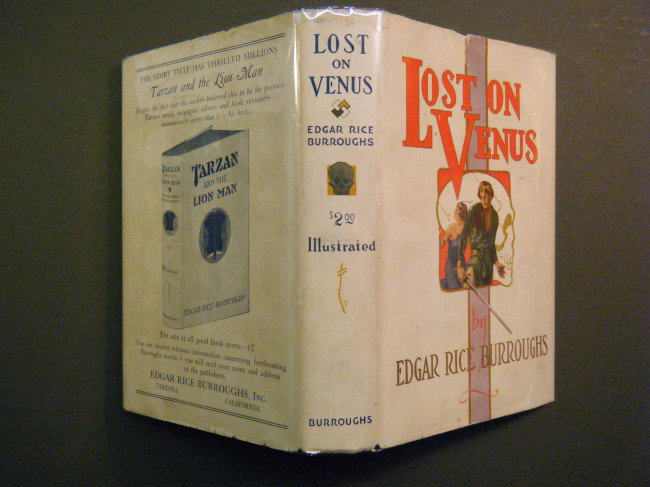 Burroughs, Edgar Rice Lost on Venus : Edgar Rice Bu: Burroughs, Edgar Rice Lost on Venus : Edgar Rice Burroughs, Inc., Tarzana, California, 1935, Stated 1st, Blue cloth binding w/ orange lettering. VG in VG- dj.