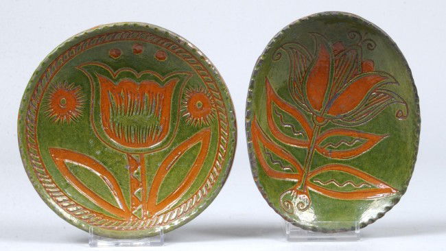 Two Greg Shooner 2005 Green Glazed Redware Pottery: Two Greg Shooner 2005 Green Glazed Redware Pottery Small Plates with tulip and foliate sgrafitto decoration. Circular plate measures 5 7/8" diam. And oval plate/soap dish measures 6 1/8" long. Conditi