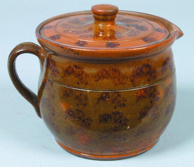 Greg Shooner 2004 Redware Pottery Squat Form Pitche: Greg Shooner 2004 Redware Pottery Squat Form Pitcher with lid and applied ribbed loop handle, orange and green glaze having brown mottling, 61/2" high overall. Condition: good with intentional wear.