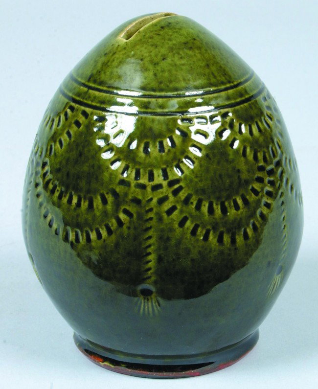Christine Sauders, Mercersburg, PA, 2007 Egg Form S: Christine Sauders, Mercersburg, PA, 2007 Egg Form Still Bank with spinach green glaze and stamped drape and tassel decoration. 5" high. Condition: good.