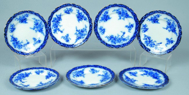 Ten Flow Blue Ironstone Plates, 8 3/4"d.; Touraine: Ten Flow Blue Ironstone Plates, 8 3/4"d.; Touraine design with gold accents. Marked: Stanley and Henry Alcock Pottery Co. Condition: under rim chip on one plate.