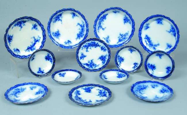 Thirteen Pieces Flow Blue Ironstone Tableware, Fou: Thirteen Pieces Flow Blue Ironstone Tableware, Four service dishes 7 3/4"d., four B&B plates 6 1/2"d., five side dishes 5 1/4"d. Touraine design with gold accents. Marked: Stanley and Henry Alcock Pot