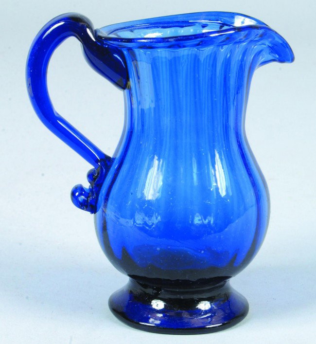 Stiegel Type Blown Cobalt Blue Creamer, 4 3/4"h.; : Stiegel Type Blown Cobalt Blue Creamer, 4 3/4"h., pad foot, reeded neck, applied handle and rolled rim. No marks. Condition: Good