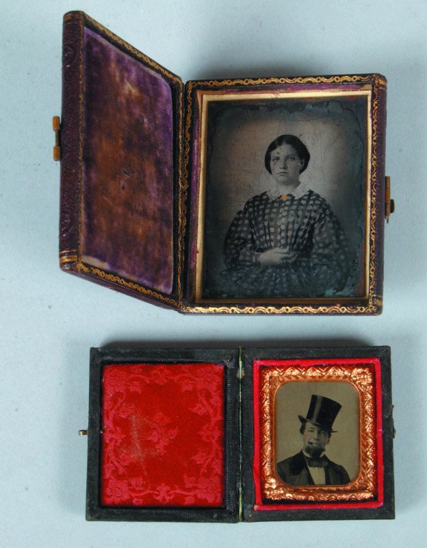 Two Tin-type Images in Leatherette cases; Gentlema: Two Tin-type Images in Leatherette cases; Gentleman wearing a top hat and having a cigar in his mouth, 2" x 1 3/4" overall and a young lady, 2 7/8" x 2 1/2" overall. Condition: good.