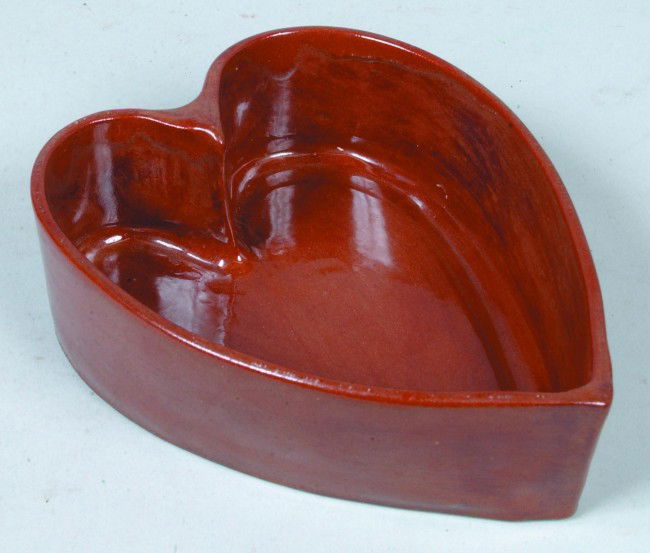 Contemporary Redware Dish, 7"l.; heart shaped mold: Contemporary Redware Dish, 7"l.; heart shaped mold or dish. Signed: "L. (Lester)Breininger, Robesonia, PA. 1987". Condition: Good