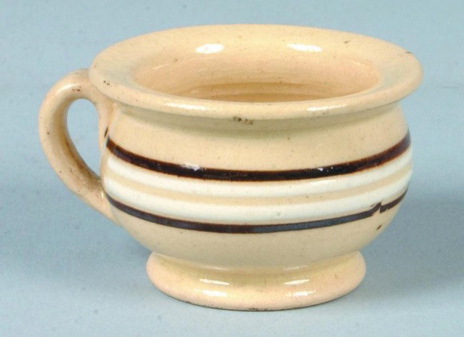 Miniature Yelloware Chamber Pot, 1 1/2"h. x 2 1/4": Miniature Yelloware Chamber Pot, 1 1/2"h. x 2 1/4"d.; brown banded with applied handle. No markings. Condition: Good