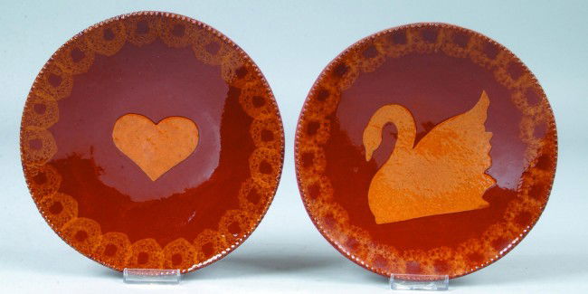 Foltz Pottery Decorated Redware Dish, 9" diam., sp: Foltz Pottery Decorated Redware Dish, 9" diam., sponge decorated slip border, heart and swan design in center, Signed "C. H. Foltz 1988-89." Condition: Good.