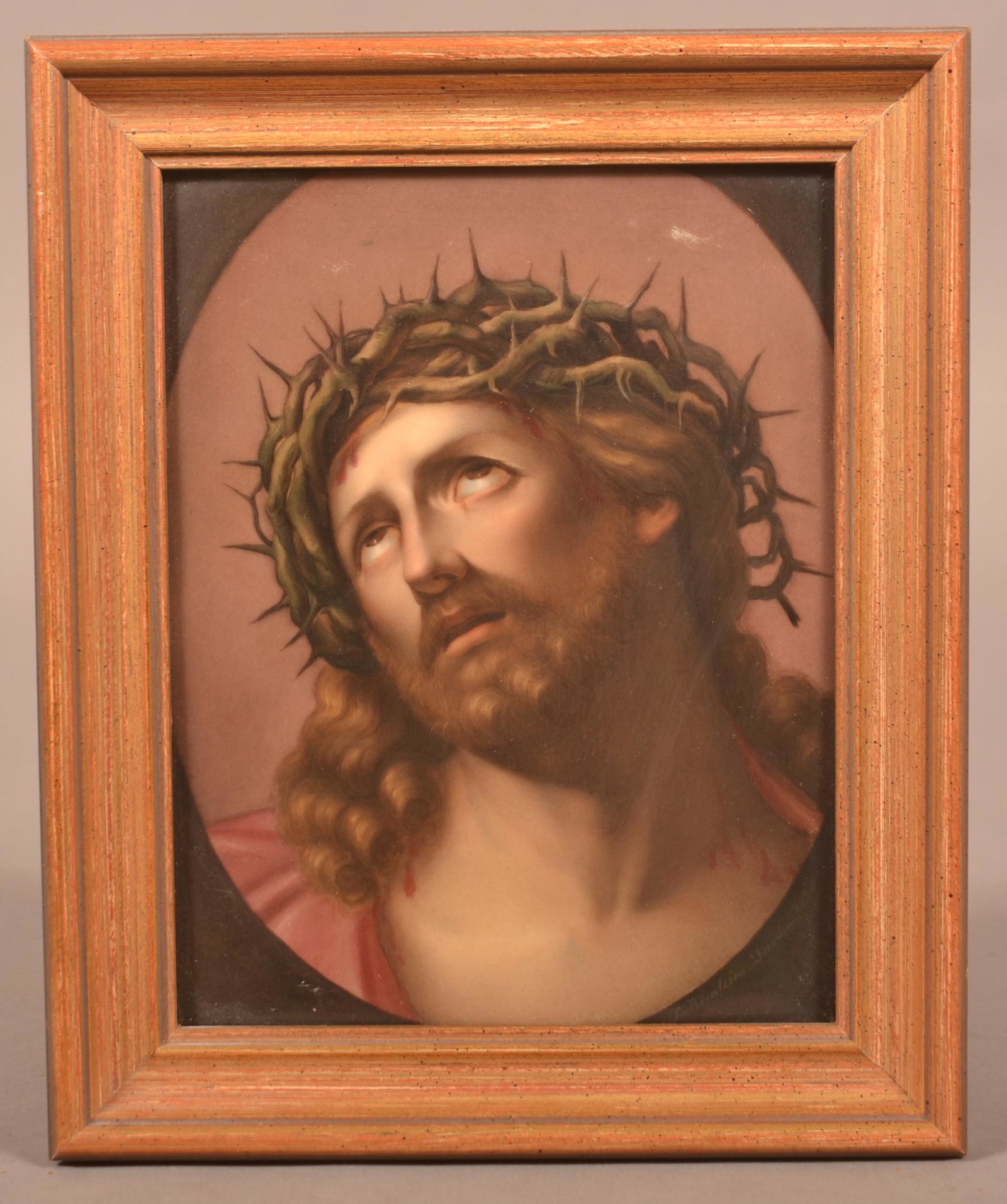 KPM Plaque of Christ with A Crown of Thorns.: KPM Hand-Painted Porcelain Plaque of Christ with A Crown of Thorns. KPM with sceptre impressed mark. Provenance: Sam Stayer Estate, Mt. Joy, PA, Birmingham, AL. In a gilt-molded frame, 9" x 7-1/4" ove