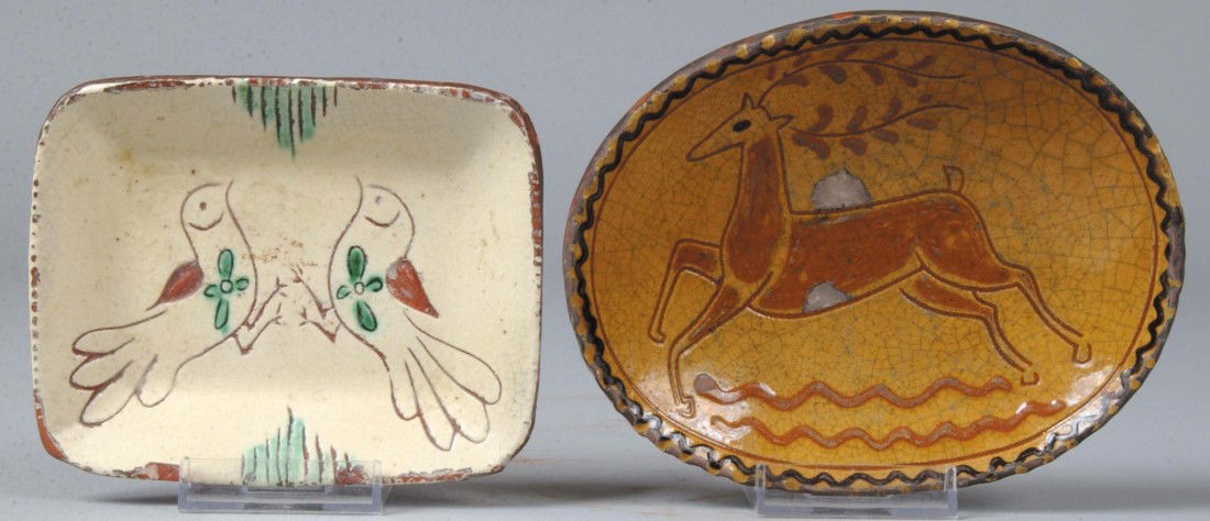 Two Small Redware Dishes, one oval with brown deer: Two Small Redware Dishes, one oval with brown deer on ochre ground, marked: "Mary, 2003" (Mary Shooner, Oregonia, OH.) 6"l.; other square, white glazed with sgraffito birds and green accents, marked: