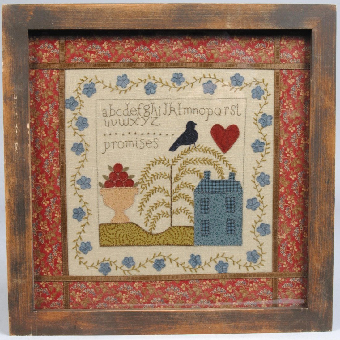Patchwork and Stitched Art Composition, sampler-lik: Patchwork and Stitched Art Composition, sampler-like sewn image of house, bird, urn of apples and tree with stitched alphabet and floral border with calico fabric and tape matte, in wood frame. Labele
