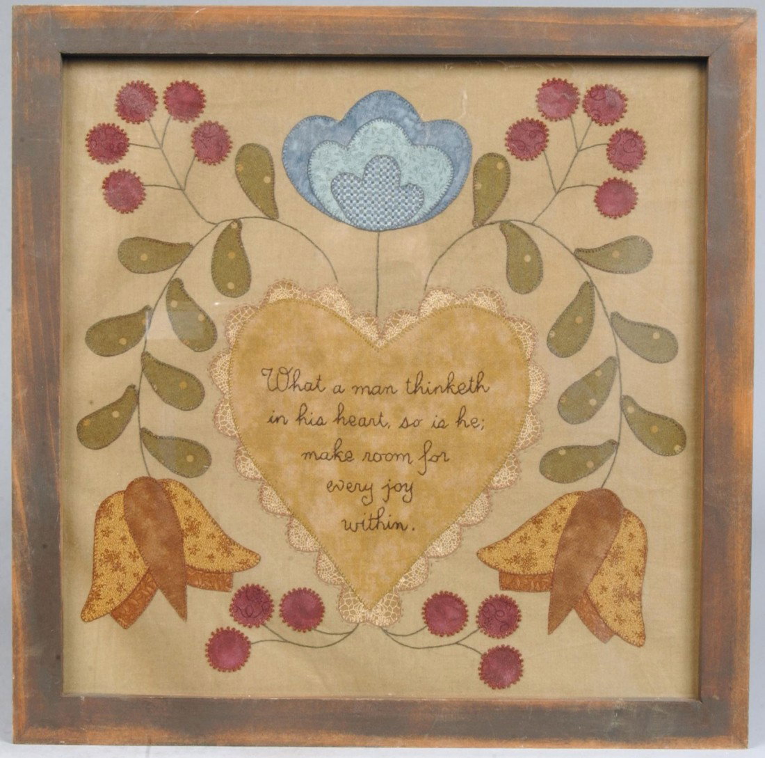 Framed Stitched Fabric Composition, multi-colored a: Framed Stitched Fabric Composition, multi-colored applied flowers & hearts, hand written slogan on heart. Labeled on reverse: "Ruthe Martz" 15 1/4" X 15 1/4" Condition: Good