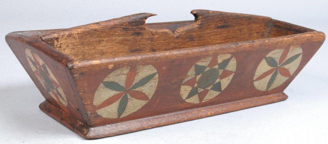 Paint Decorated Utensil Carrier, nailed joints, ov: Paint Decorated Utensil Carrier, nailed joints, overall red wash with five pinwheel designs in red, blue and white on three sides and J. H. Miller in white on one long side, beveled foot, divided tray