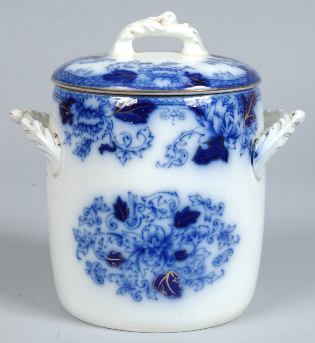 Ironstone China "Roseville" Pattern Flow Blue Tran: Ironstone China "Roseville" Pattern Flow Blue Transfer Biscuit Jar with open handles by John Maddock & Sons.7 1/4" high. Condition: good.