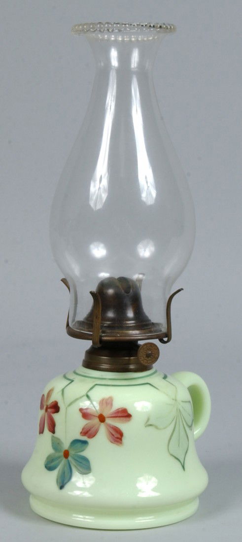 Light Green Opaque Glass Finger Lamp, mold blown w: Light Green Opaque Glass Finger Lamp, mold blown with applied loop handle and over-painted green leaf designs with red flowers, bras collar and burner, clear glass chimney with beaded rim. 4 1/4"h. Co
