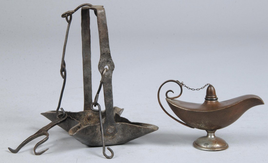 Two Fat Lamps, wrought iron four-wick hanging lamp: Two Fat Lamps, wrought iron four-wick hanging lamp, 5 1/2"h. and copper "magic lamp" style with wick cover, 4"l. Condition: Good
