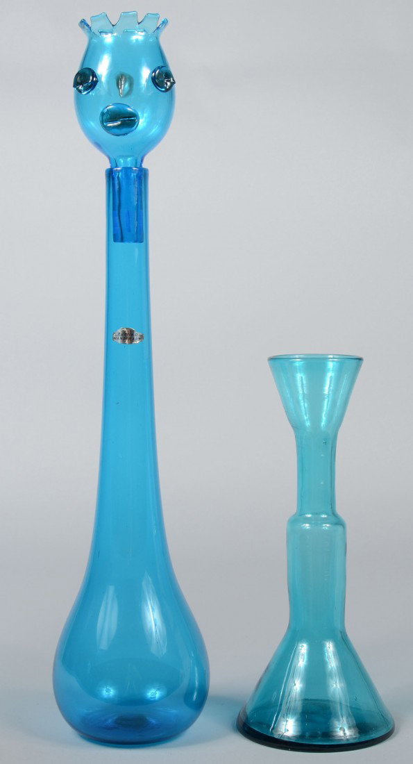 Two Tall Blenko Blue Bottles, long tear-drop shape: Two Tall Blenko Blue Bottles, long tear-drop shape with a hollow head stopper with applied facial features, unmarked except factory "hand" sticker, 24 3/4"h.; and a stepped shape bottle vase, conical 
