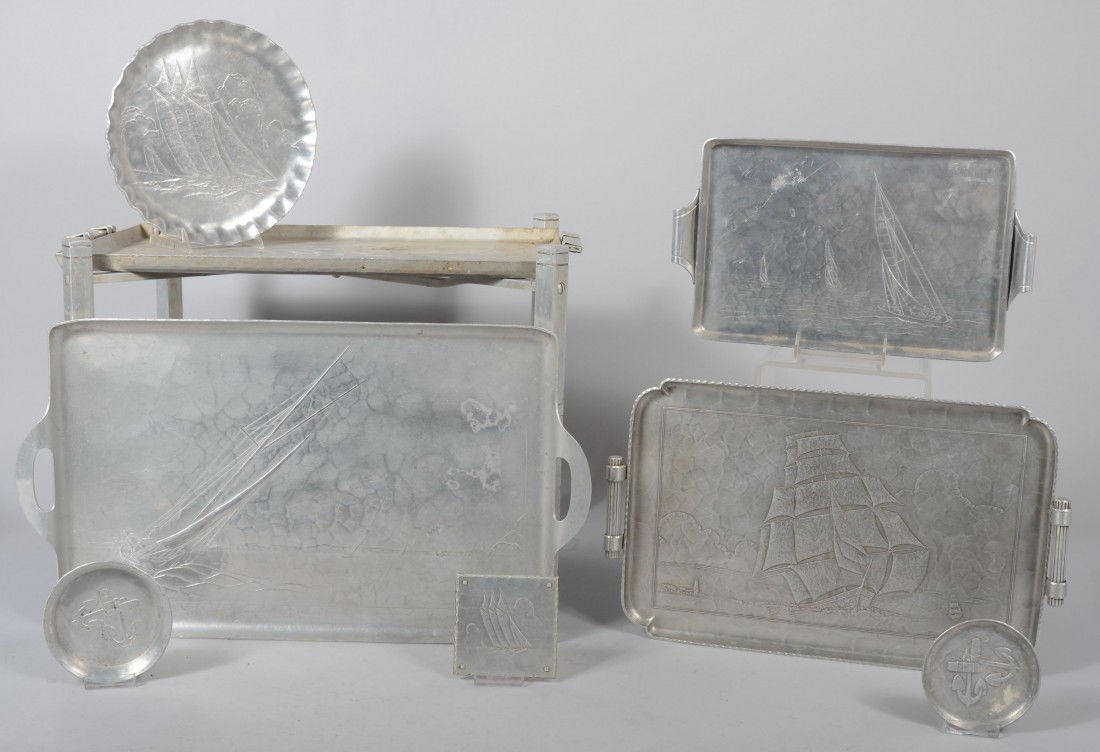 Eight Pieces of Various Boat Pattern Aluminum by W: Eight Pieces of Various Boat Pattern Aluminum by Wendell August and Arthur Armour. Sailboat design by Wendell August Forge; Butler table, 17"h x 24"w x 16"d, rectangular tray with scrolled handles, 16