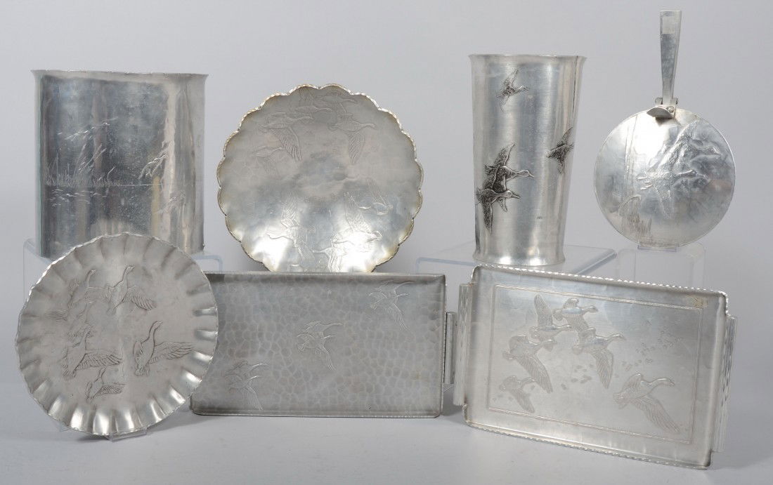 Seven Pieces of Flying Geese/Ducks Design Aluminum: Seven Pieces of Flying Geese/Ducks Design Aluminum by various makers. Wendell August Forge; 11" vase, 10" waste can, and silent butler. Arthur Armour; 14 1/4" rectangular tray, 10 3/4" plate and 11 1/
