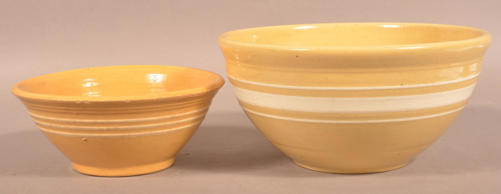 Two Antique Yellowware Mixing Bowls. (1 of 3)