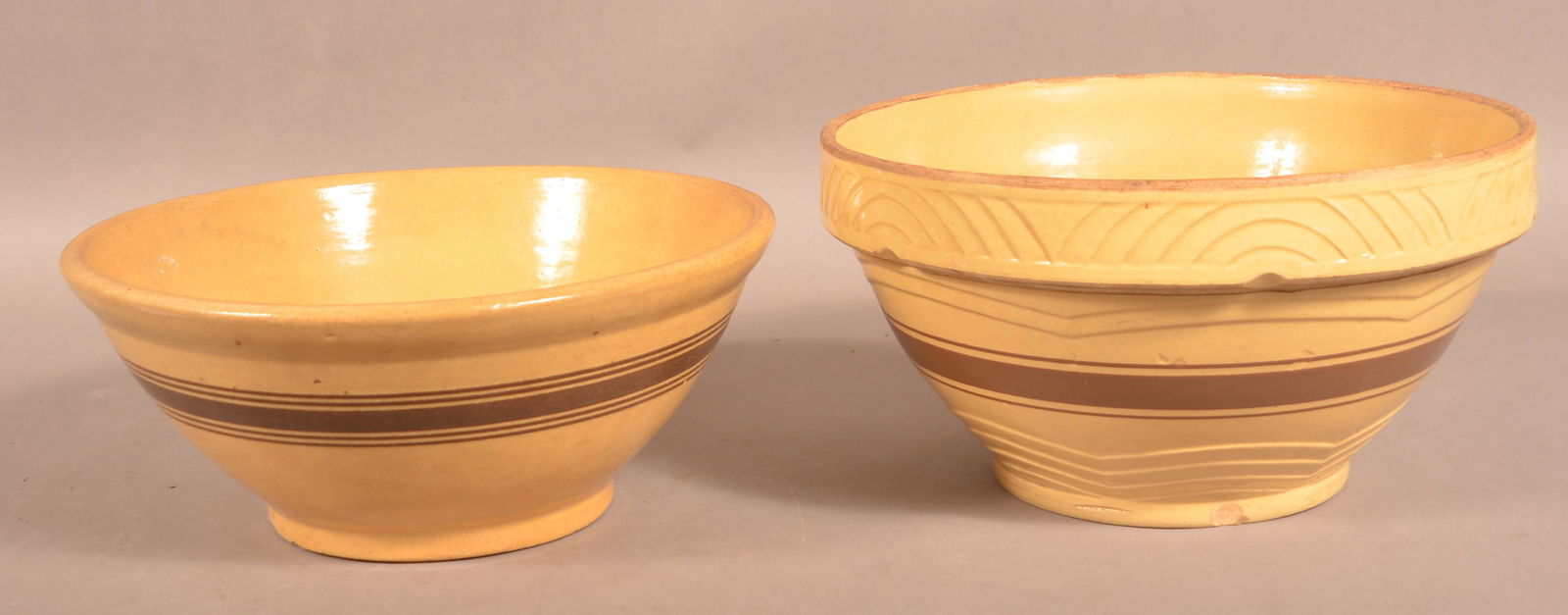 Two Antique Yellowware Mixing Bowls. (1 of 3)
