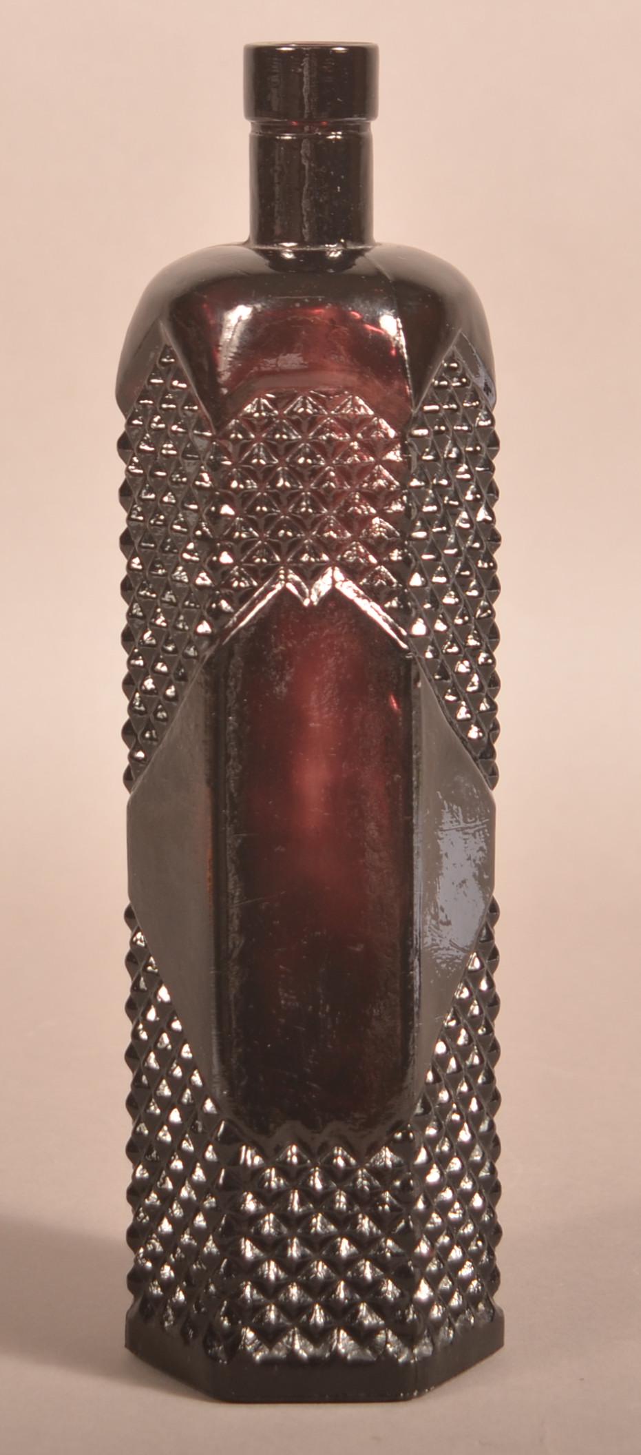 Amethyst Glass Sawtooth Design Bottle. (1 of 4)