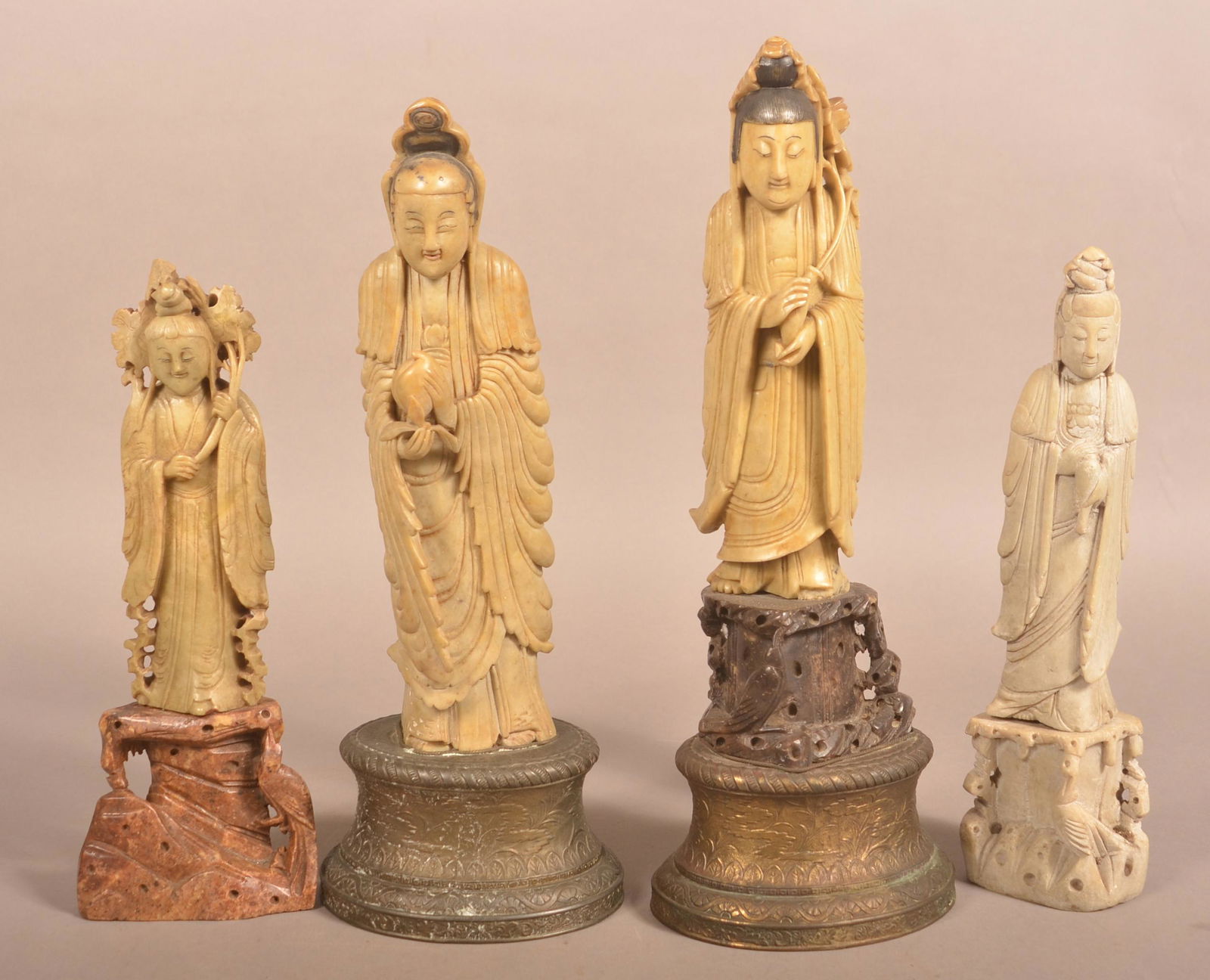 Four Oriental Carved Soapstone Figures. (1 of 2)
