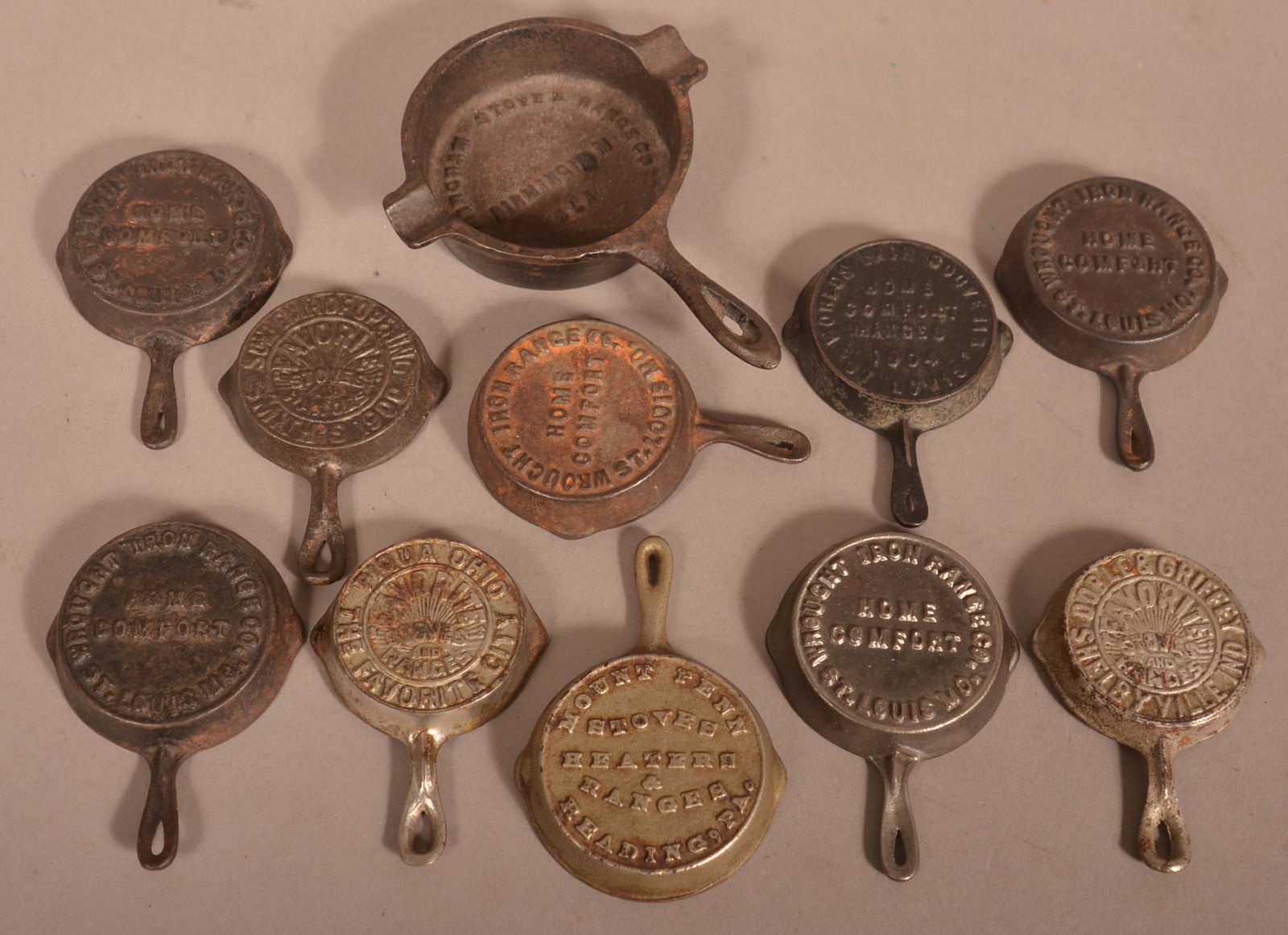 Lot of Miniature Cast Iron Advertising Skillets. (1 of 2)