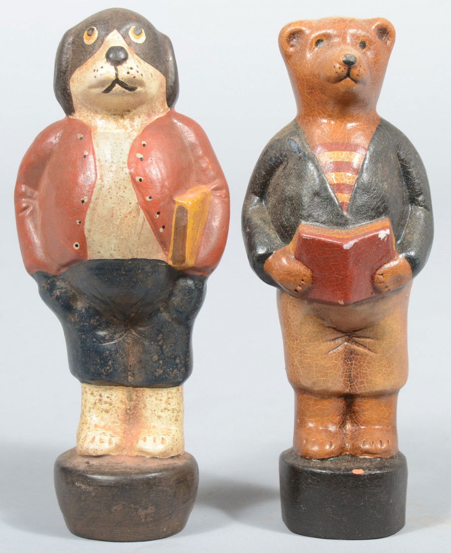 Two Pieces Contemporary Hollow Cast Redware Animal: Two Pieces Contemporary Hollow Cast Redware Animals. A book carrying Dog: 7"h. and a bookish Bear 6 3/4"h. Both marked for Springfield Pottery. Condition: Both Good with paint flakes.